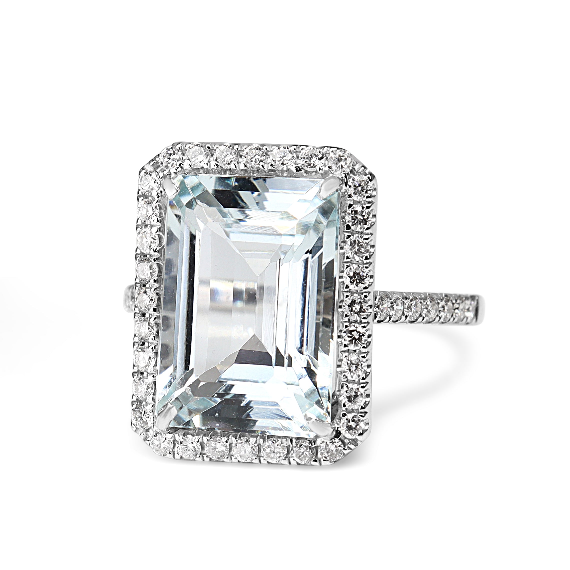 18ct White Gold Emerald Cut Aquamarine and Diamond Halo Ring