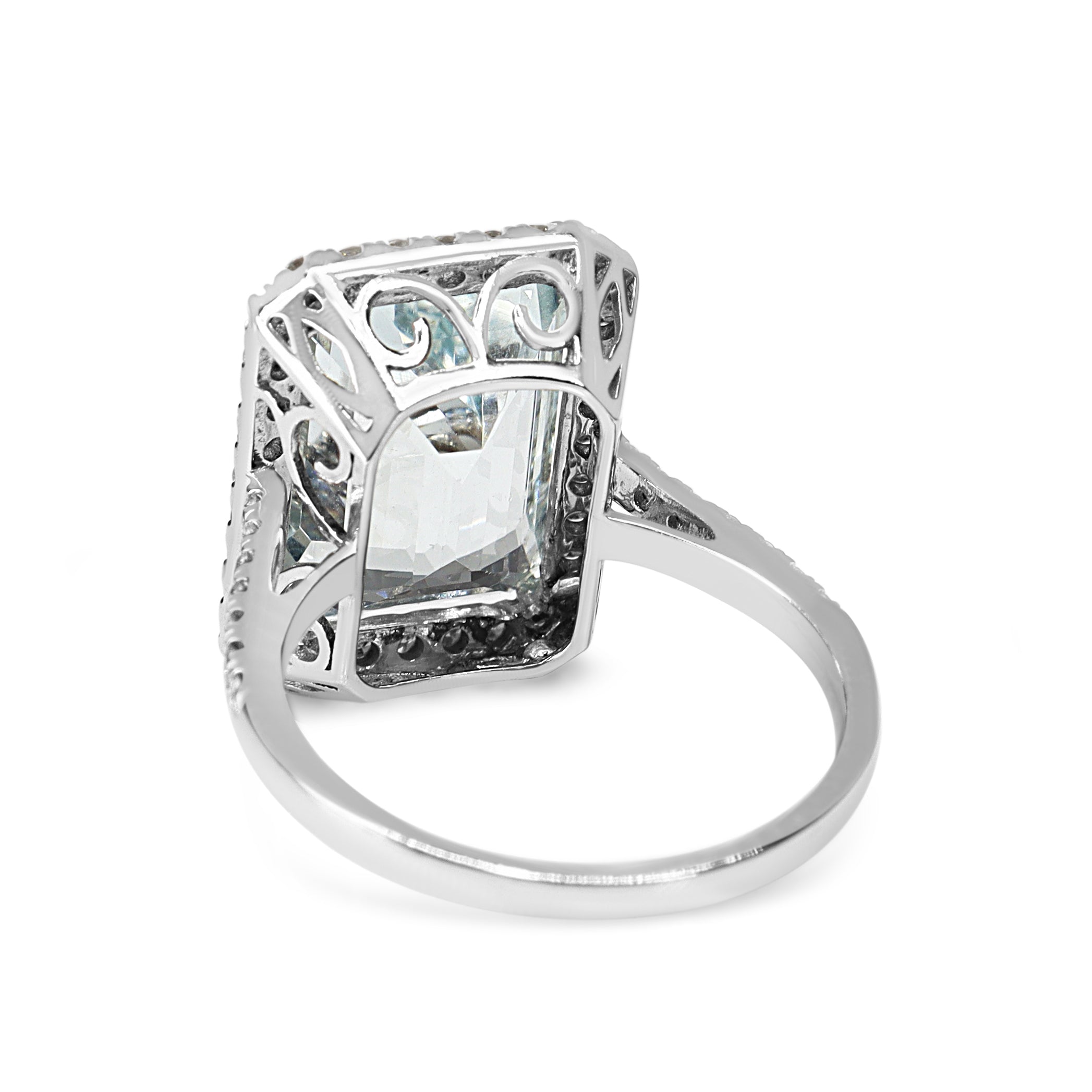 18ct White Gold Emerald Cut Aquamarine and Diamond Halo Ring