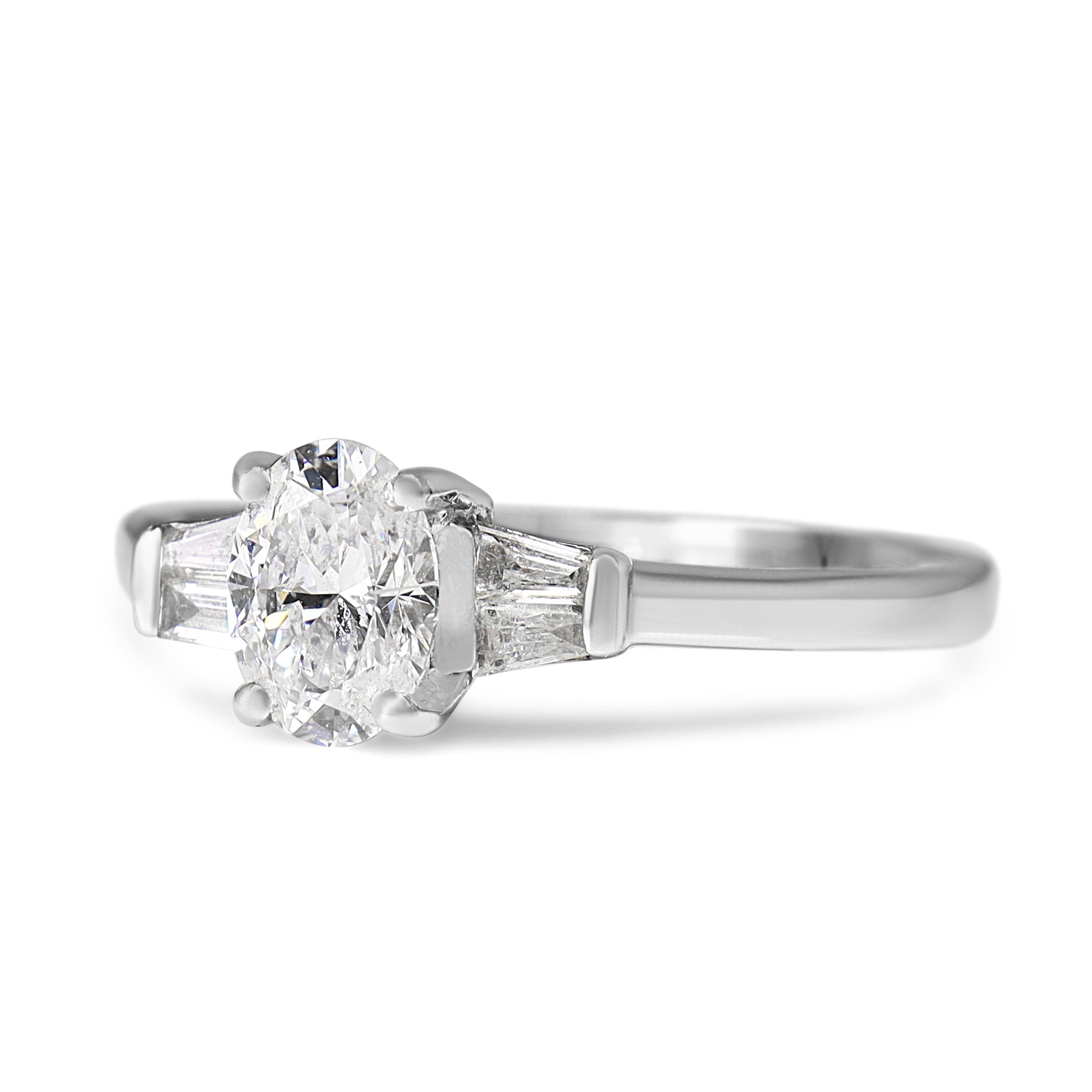 18ct White Gold Oval and Tapered Baguette Diamond Ring