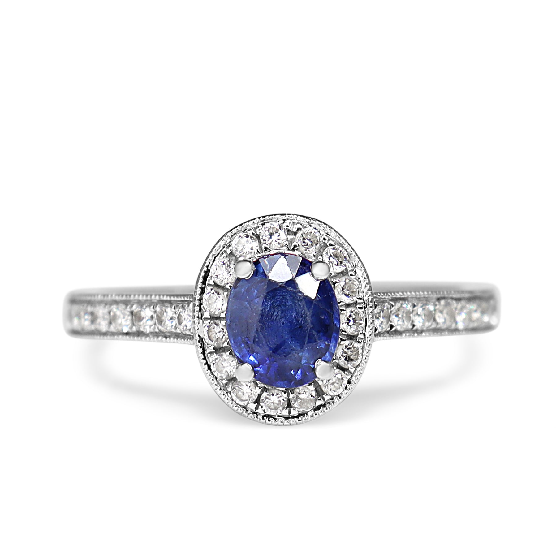 18ct White Gold Oval Sapphire and Diamond Halo Ring