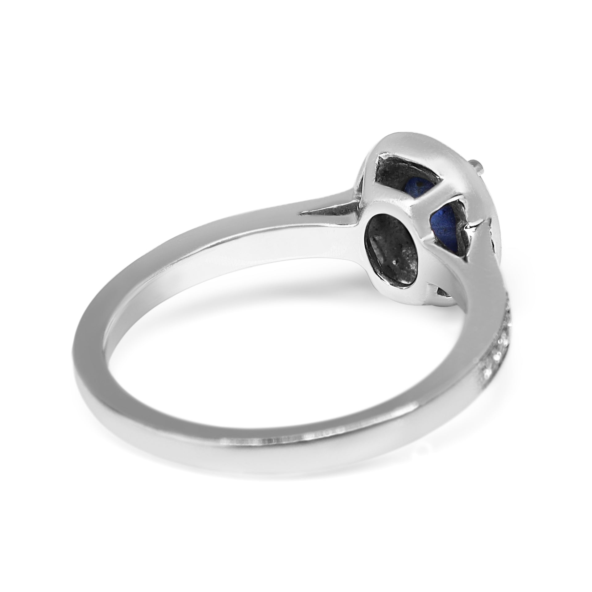 18ct White Gold Oval Sapphire and Diamond Halo Ring