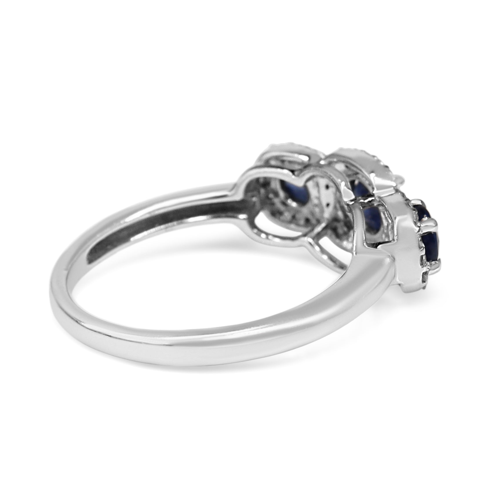 14ct White Gold Sapphire 3 Stone and Diamond Halo Ring