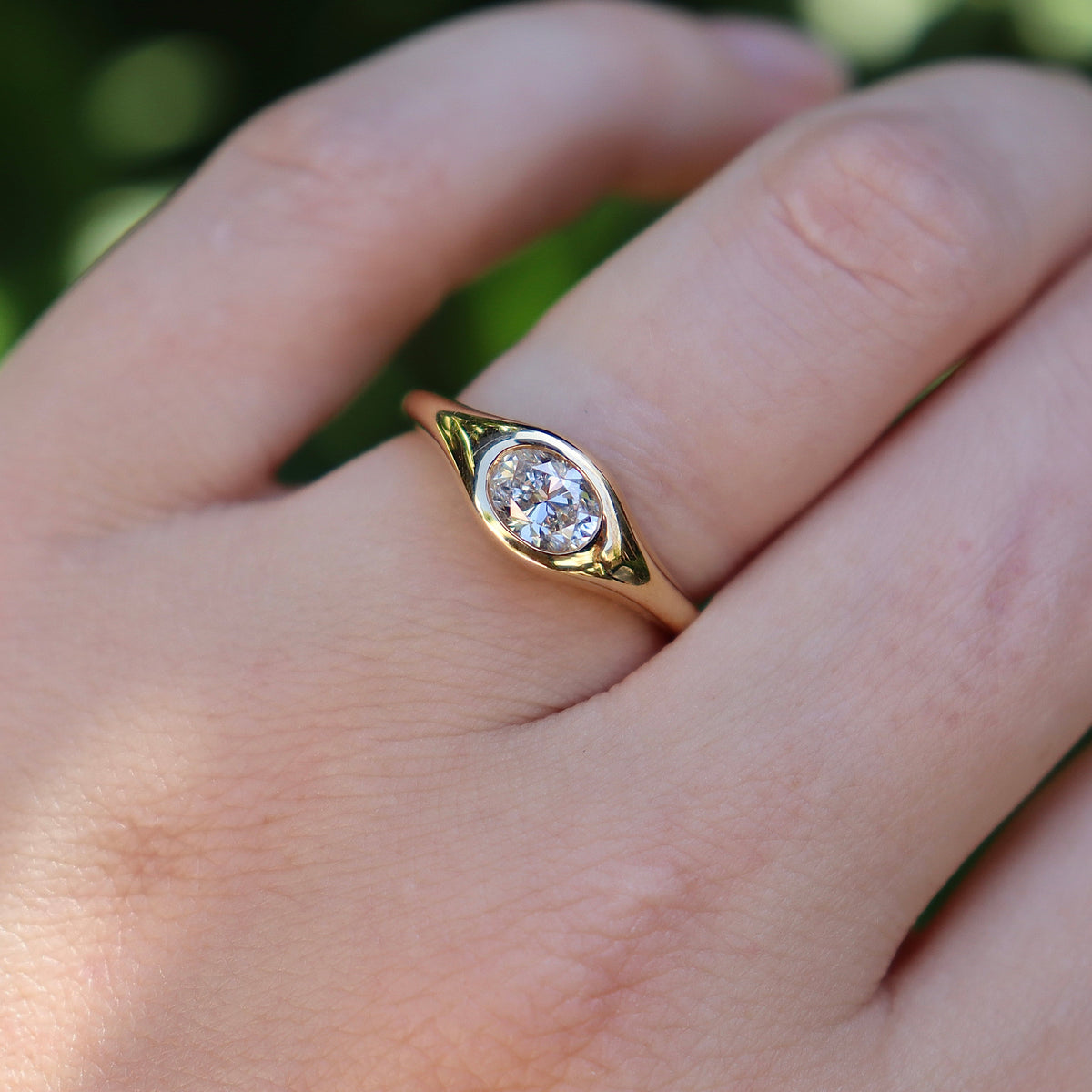 18ct Yellow Gold Oval East West Bezel Diamond Ring