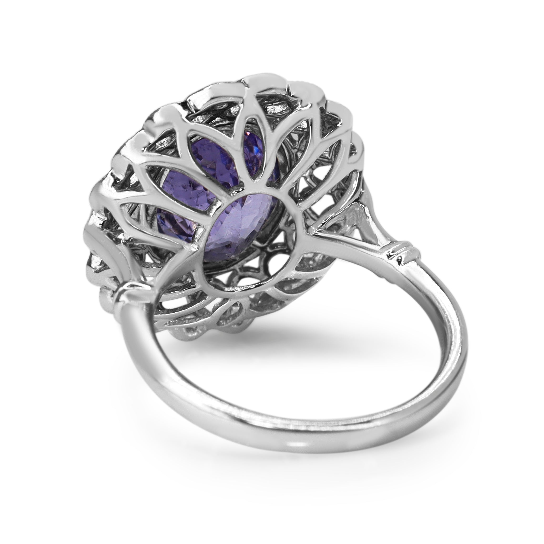 18ct White Gold Tanzanite and Diamond Fancy Halo Ring