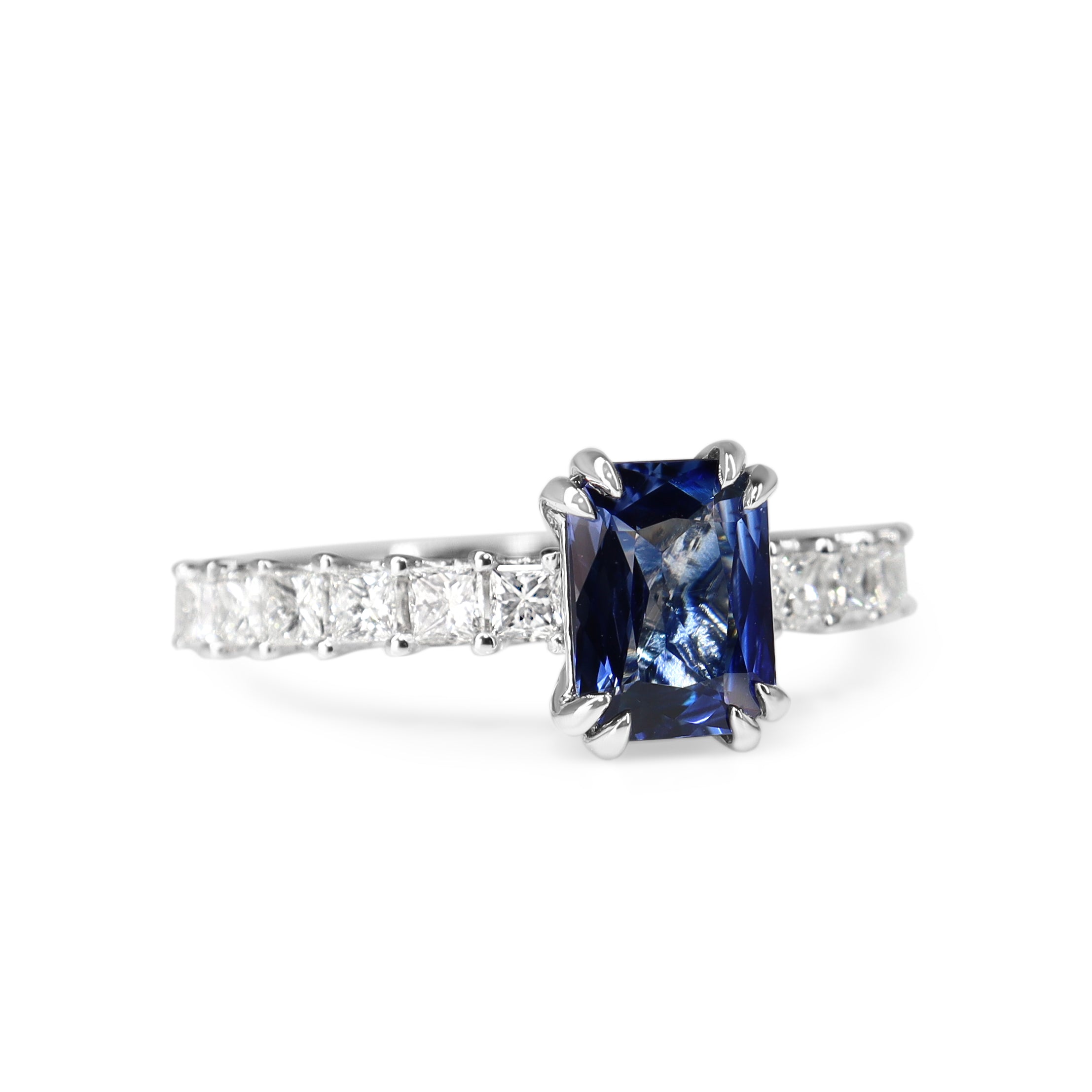 18ct White Gold Radiant Cut Sapphire and Princess Cut Diamond Solitaire Ring