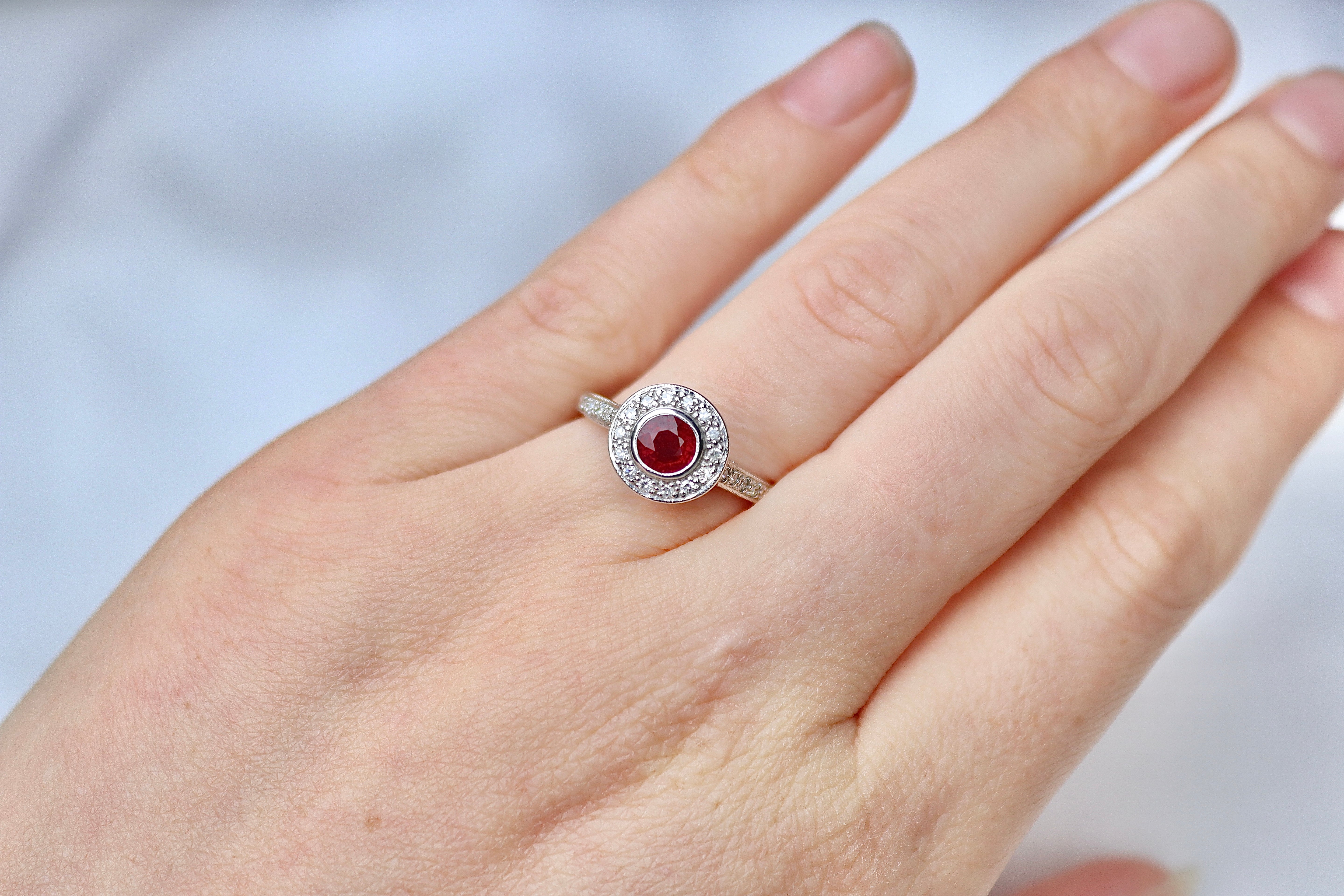 18ct White Gold Ruby and Single Cut Diamond Halo Ring