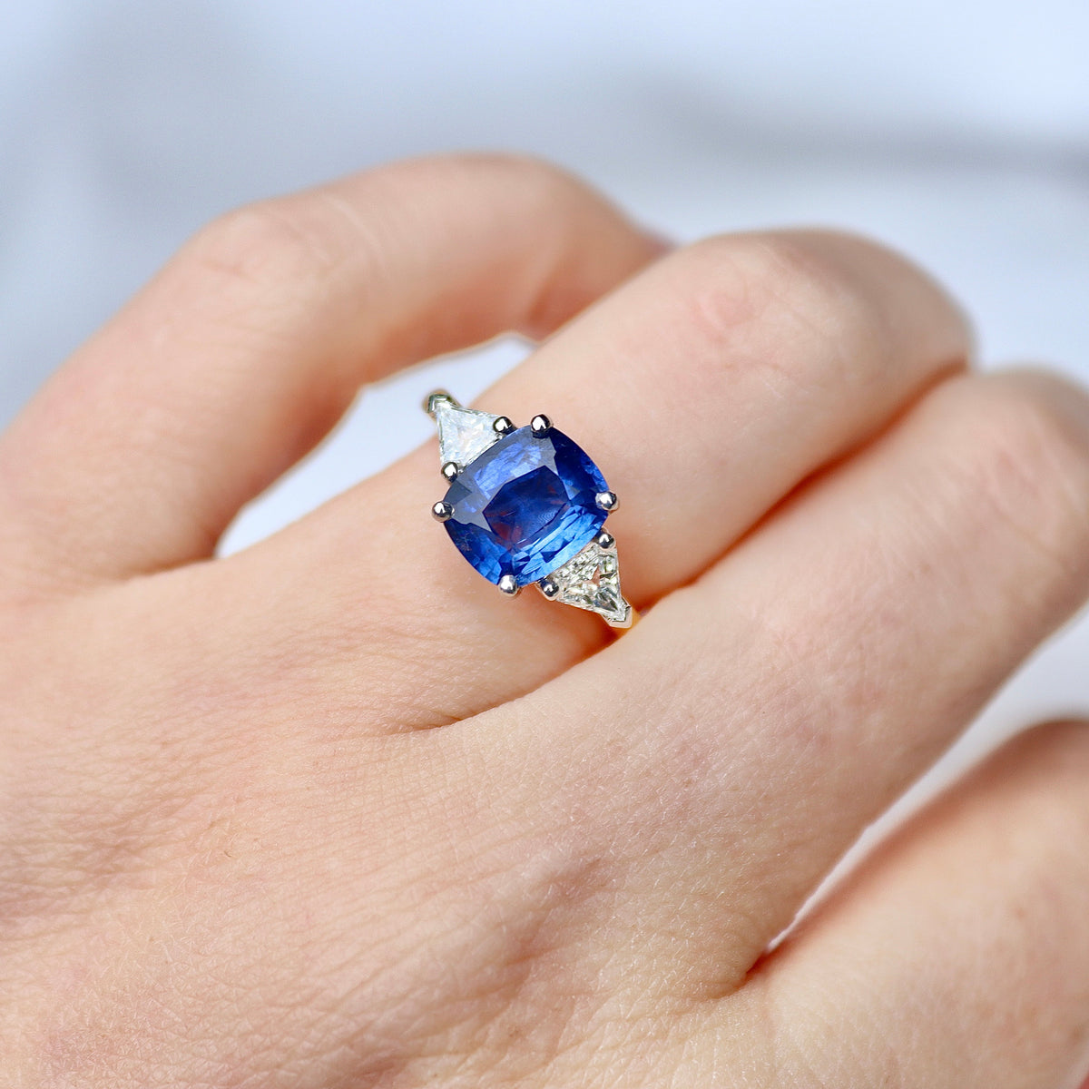 18ct Yellow and White Gold Cushion Sapphire and Trillion Diamond 3 Stone Ring