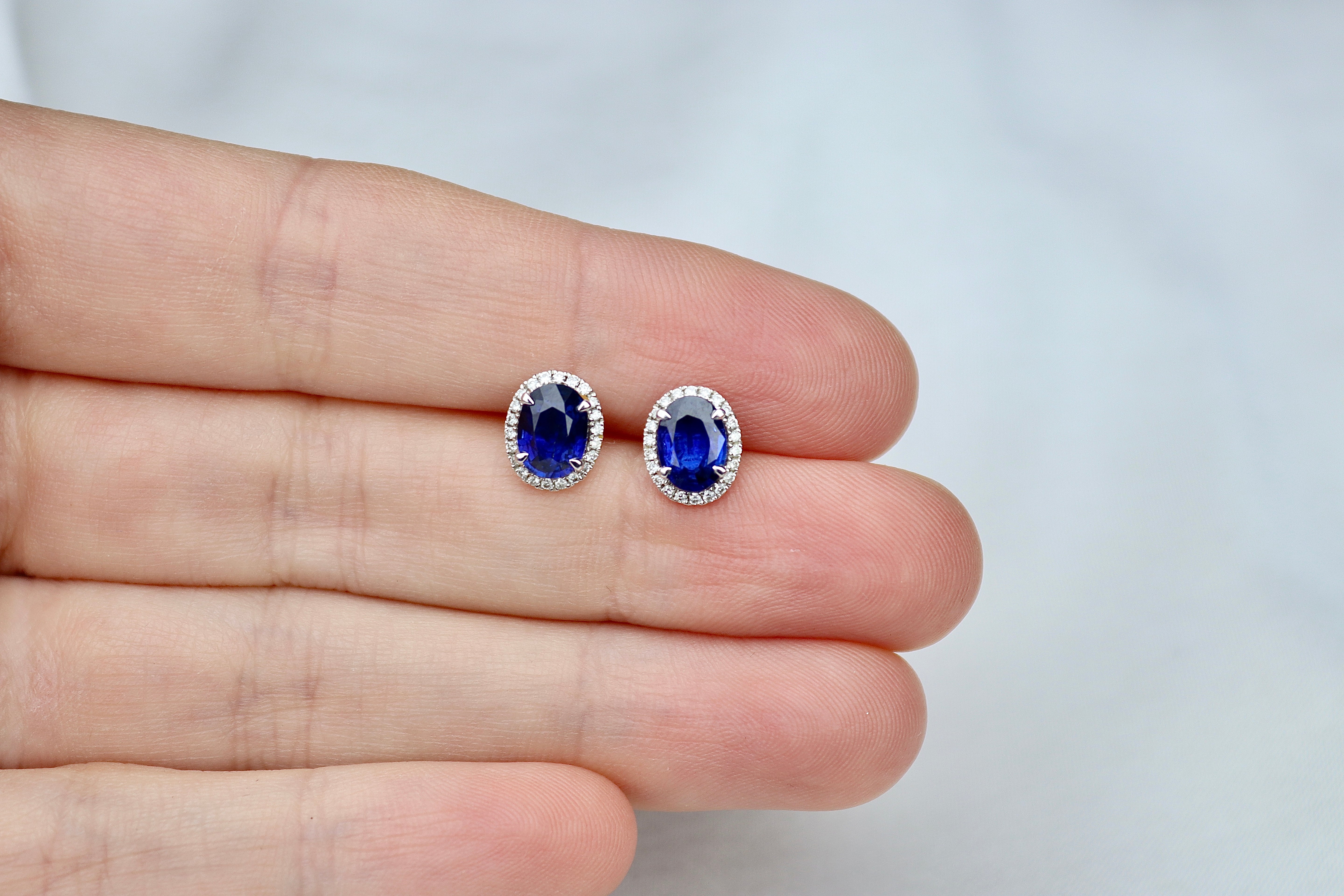18ct White Gold Sapphire and Diamond Oval Halo Stud Earrings