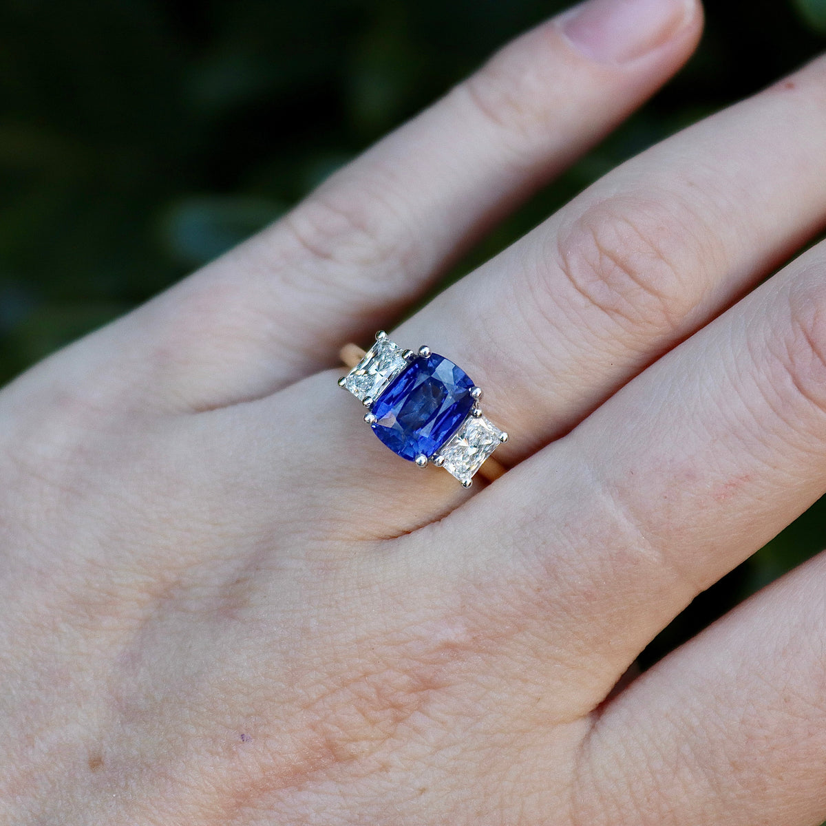 18ct Yellow and White Gold Cushion Sapphire and Radiant Cut Diamond 3 Stone Ring