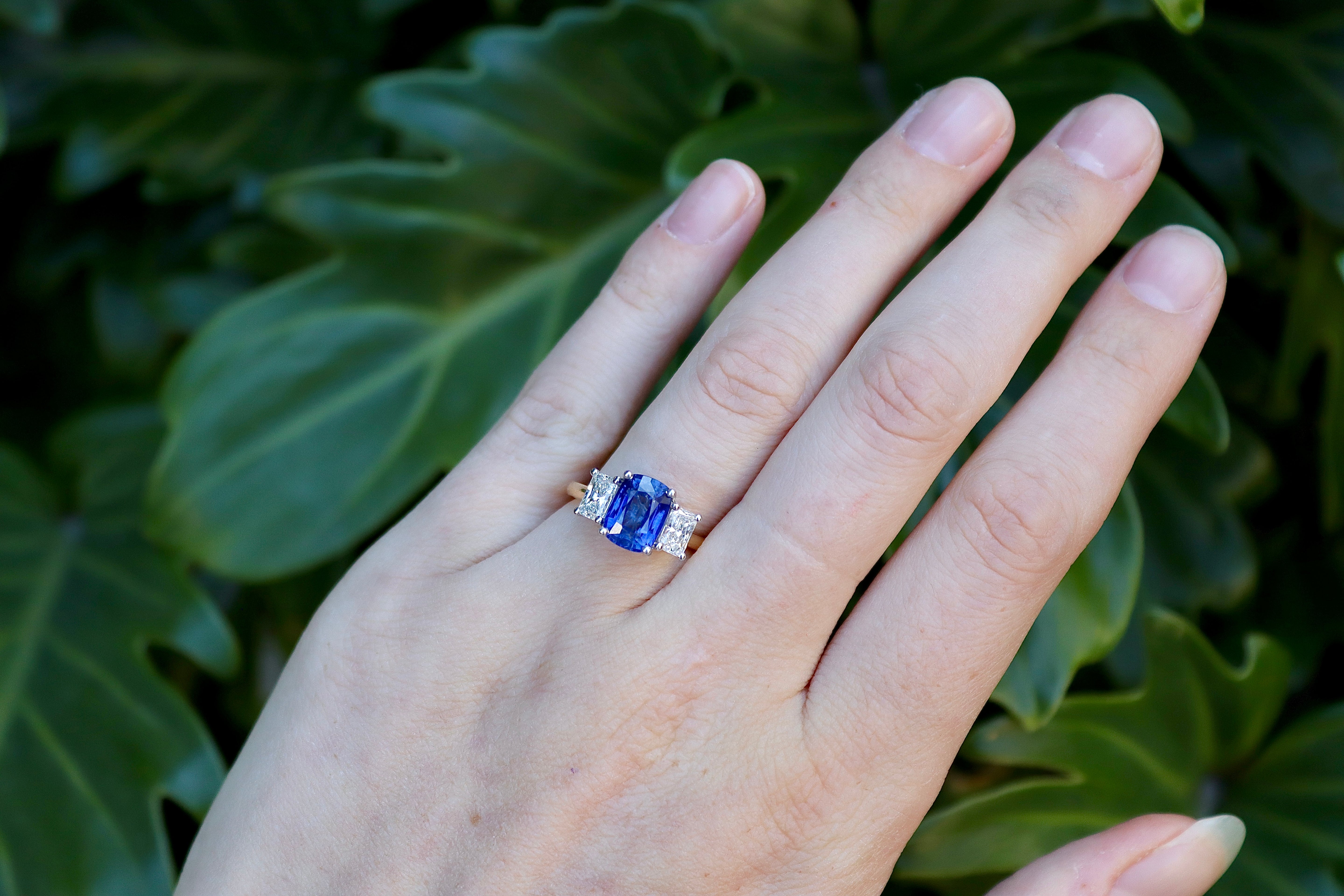 18ct Yellow and White Gold Cushion Sapphire and Radiant Cut Diamond 3 Stone Ring