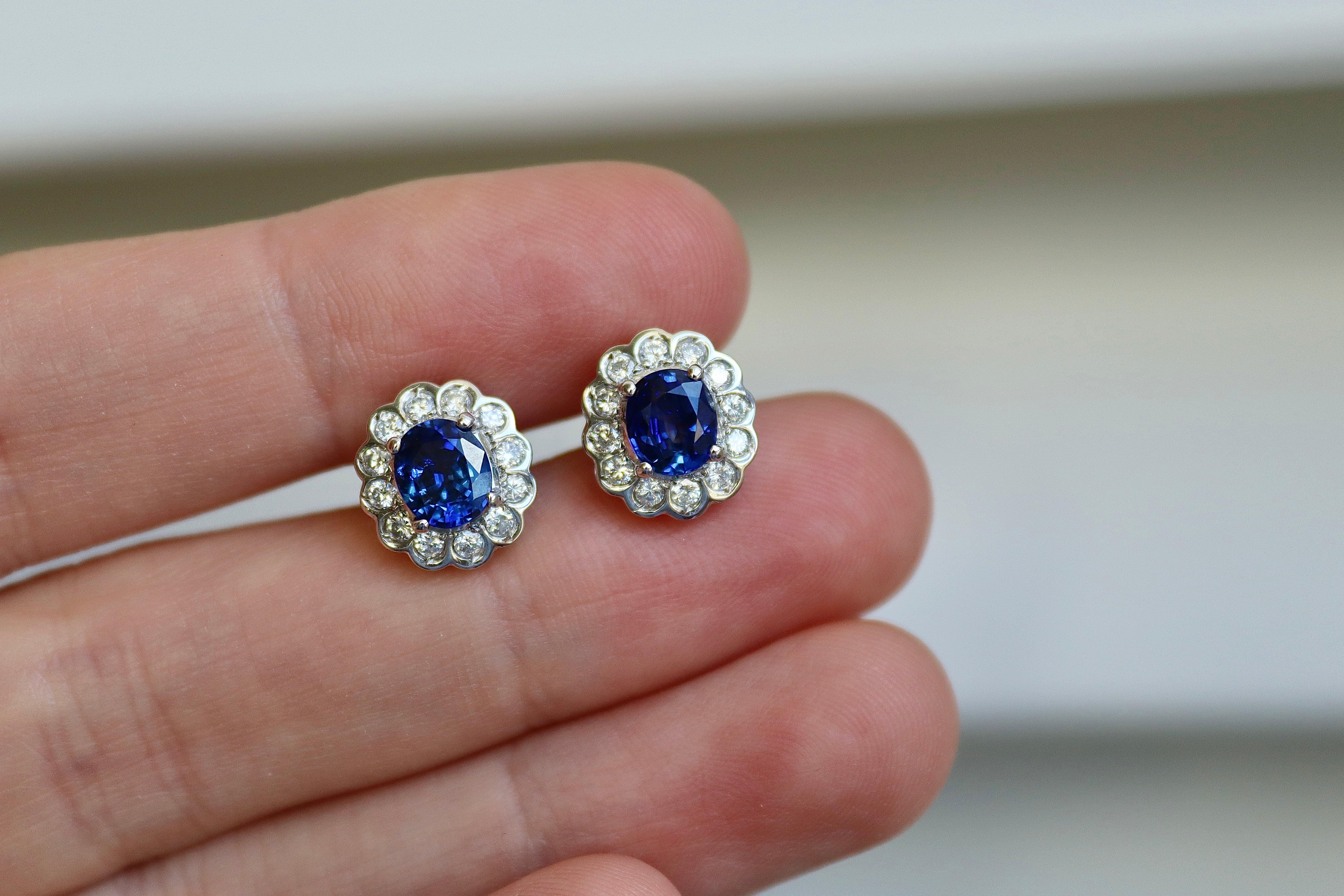 Platinum Oval Sapphire and Diamond Daisy Halo Earrings