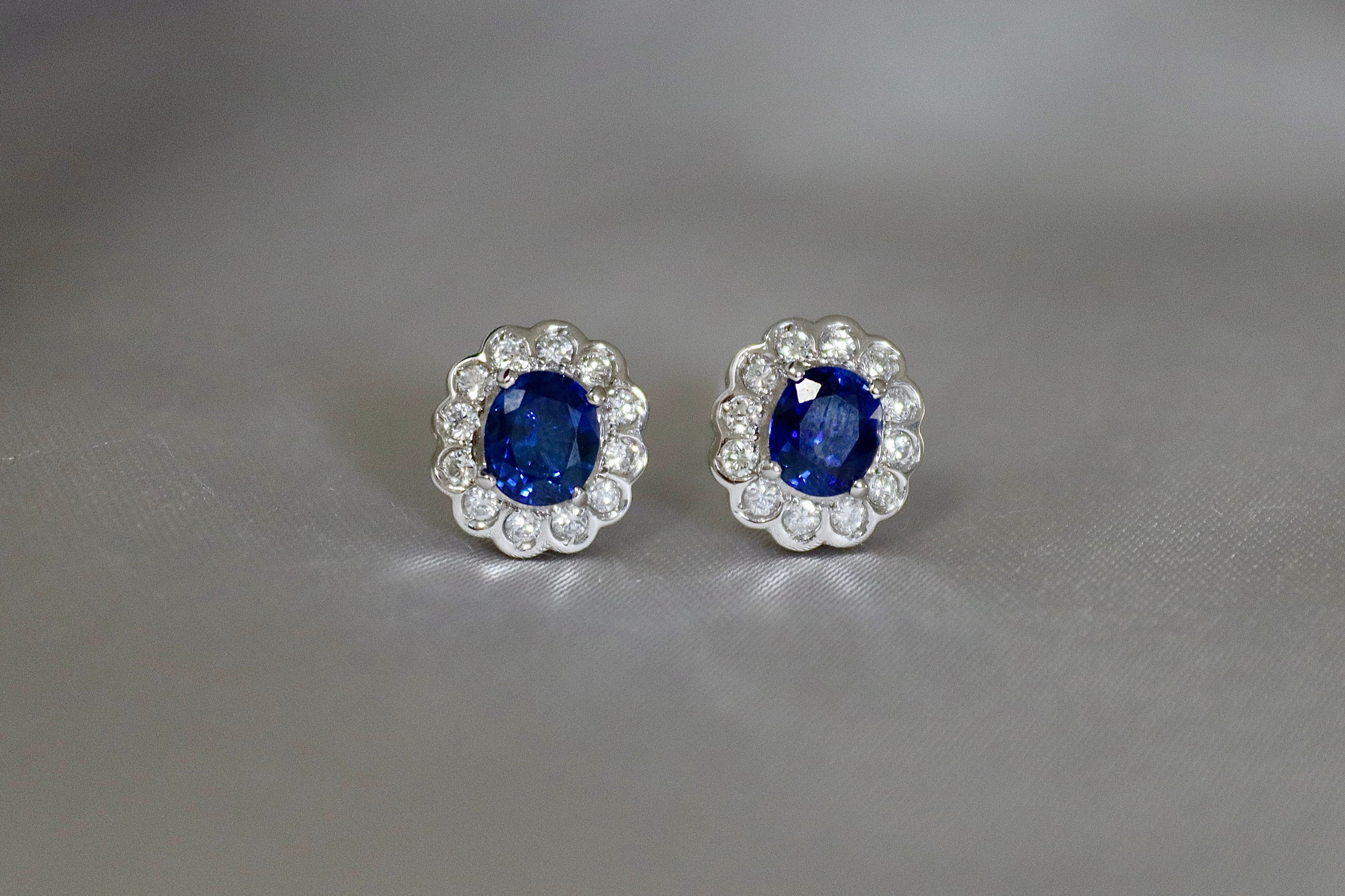 Platinum Oval Sapphire and Diamond Daisy Halo Earrings