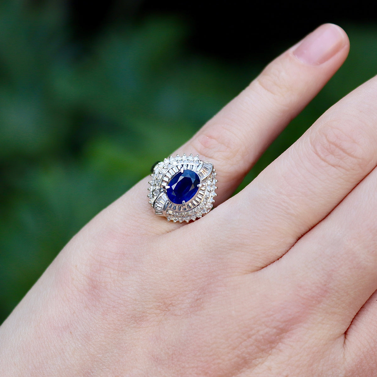 Platinum Sapphire and Round and Baguette Cluster Diamond Ring