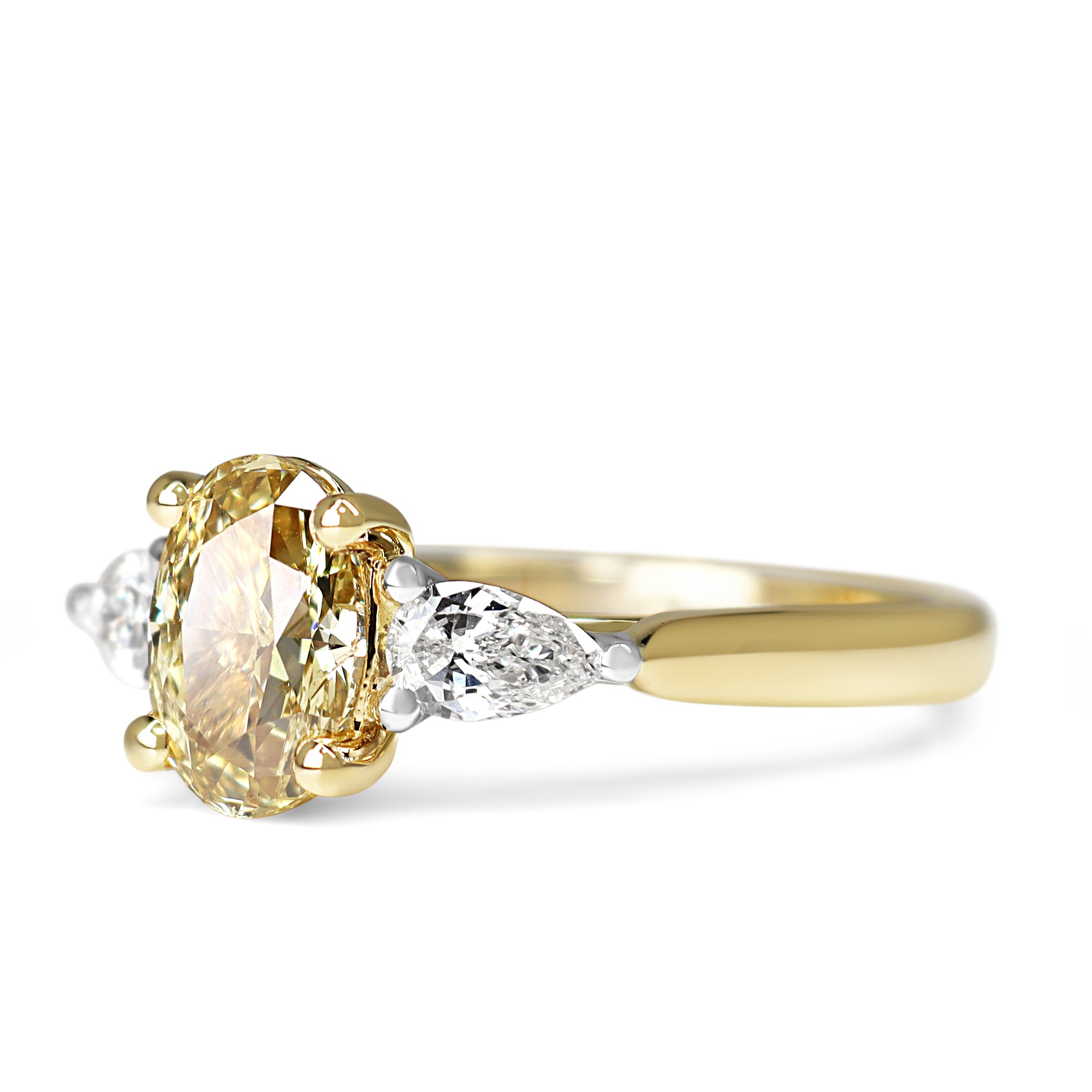 18ct Yellow and White Gold Oval Yellow Diamond and White Pear Cut 3 Stone Ring