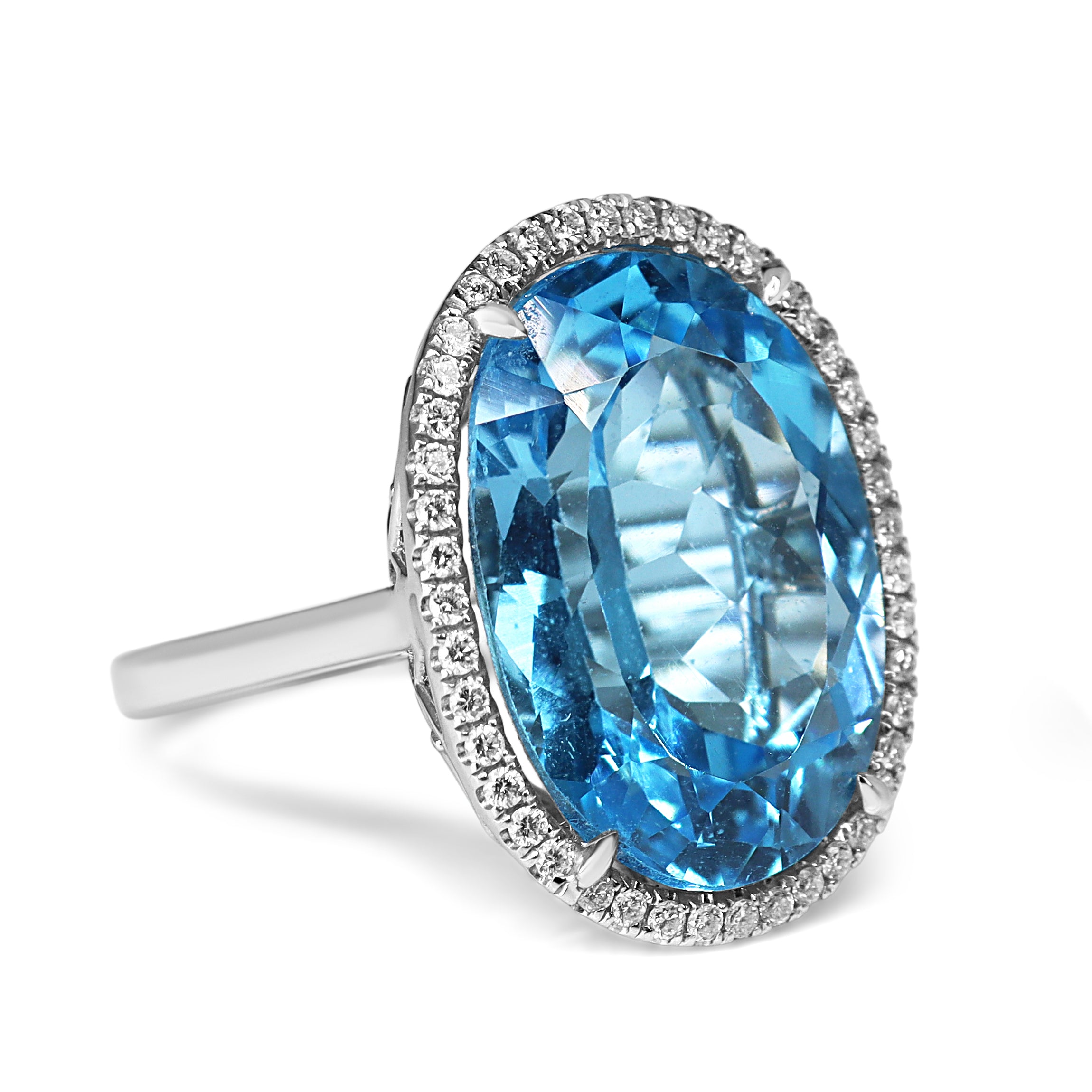 18ct White Gold Topaz and Diamond Halo Cocktail Ring