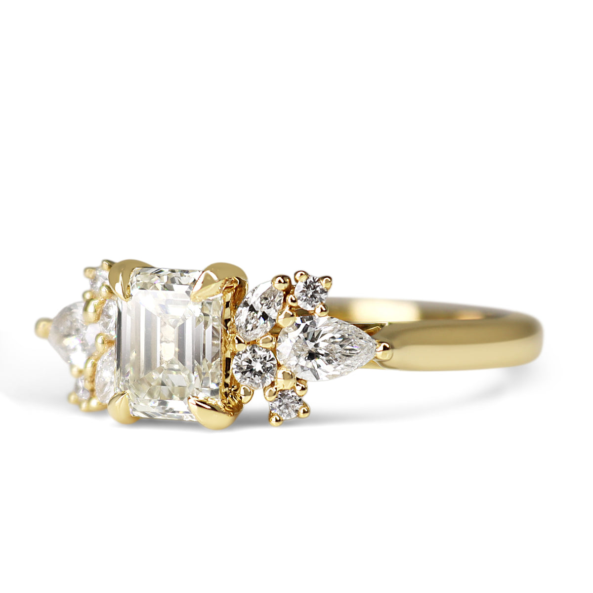 18ct Yellow Gold Tinted Emerald Cut with Pear and Marquise Accents Diamond Ring