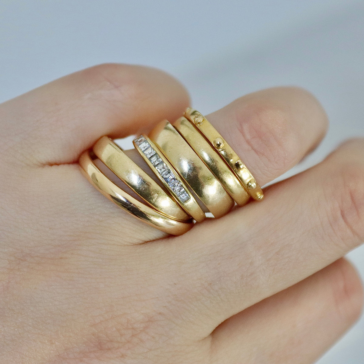Solid gold 4mm wedding band with elegant minimalist styling