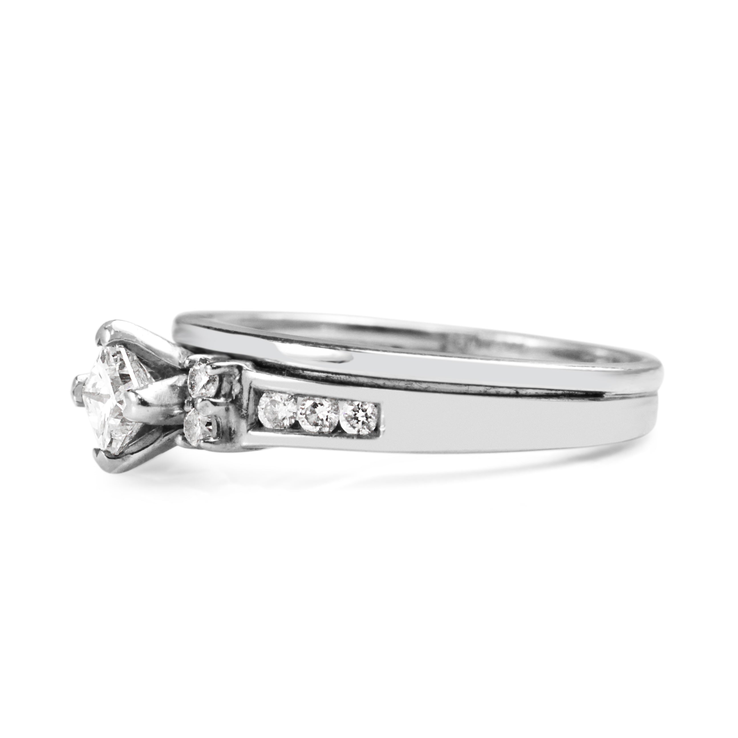 Side view of the 14ct white gold diamond ring set