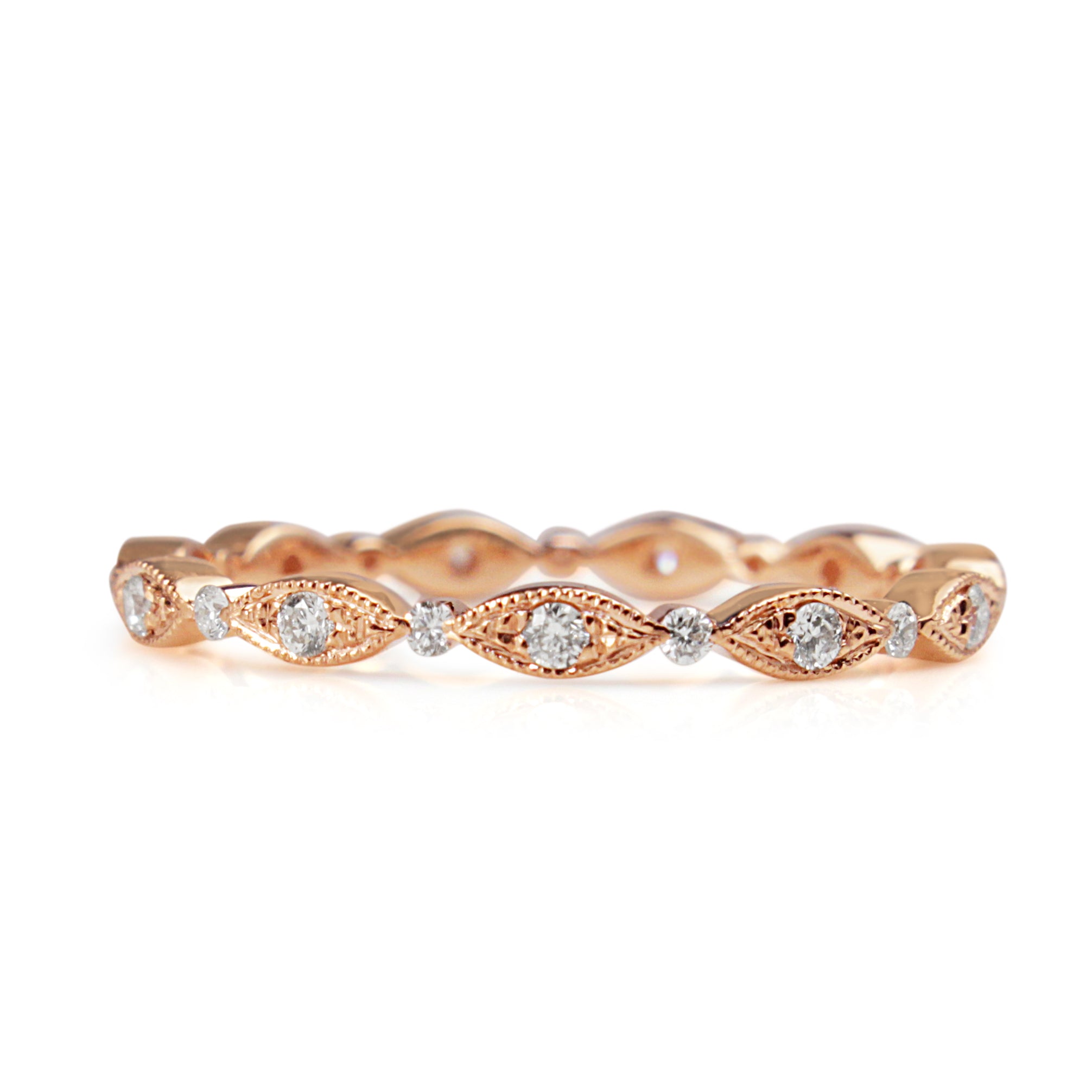 Front view of an 18ct rose gold all round diamond vintage style band