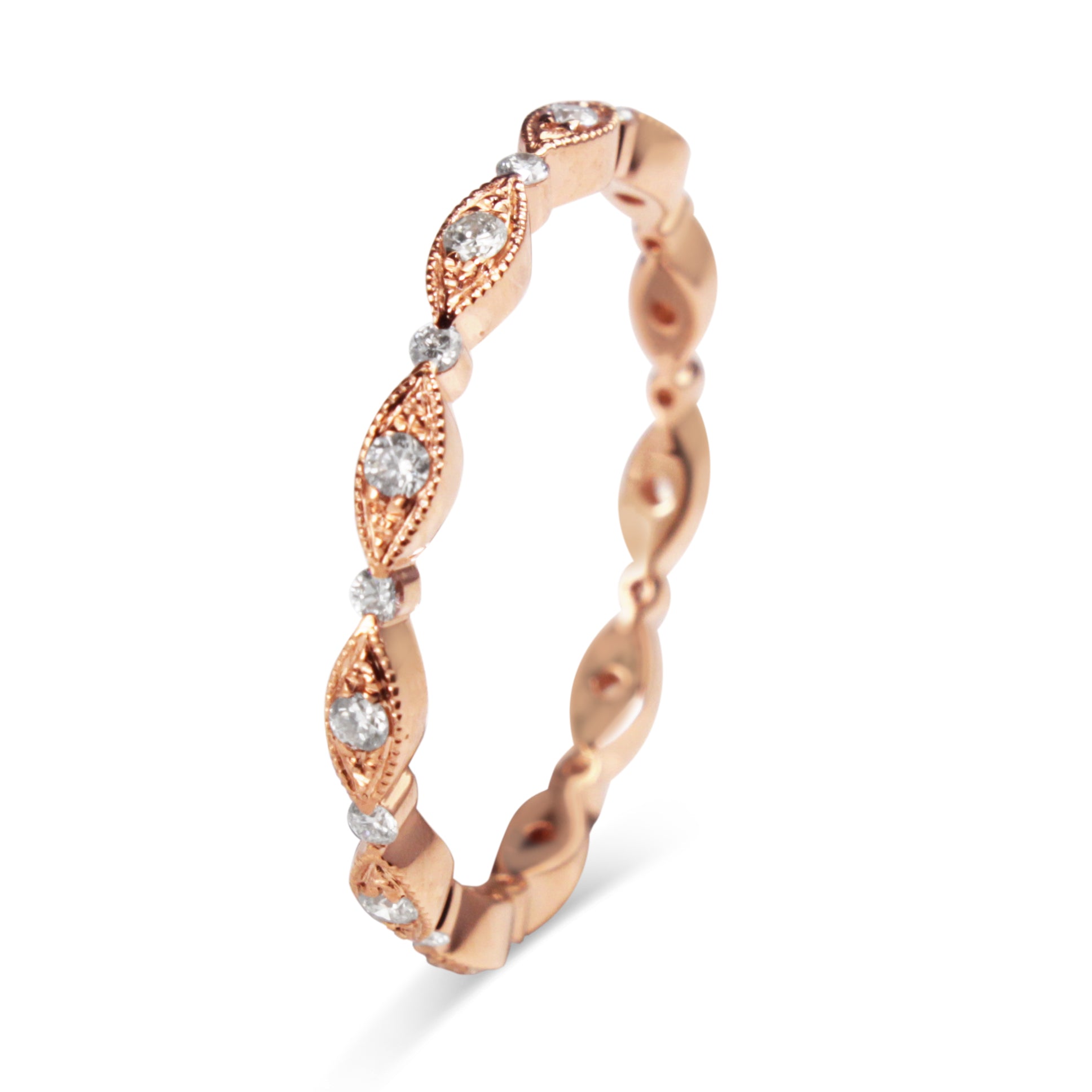 Side view of the slim 18ct rose gold diamond band