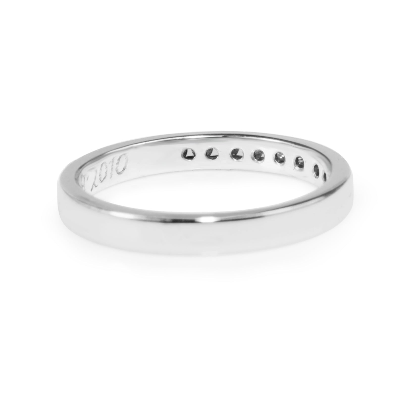 Rear view of 18ct white gold diamond band showing the plain band and reverse of the channel settings