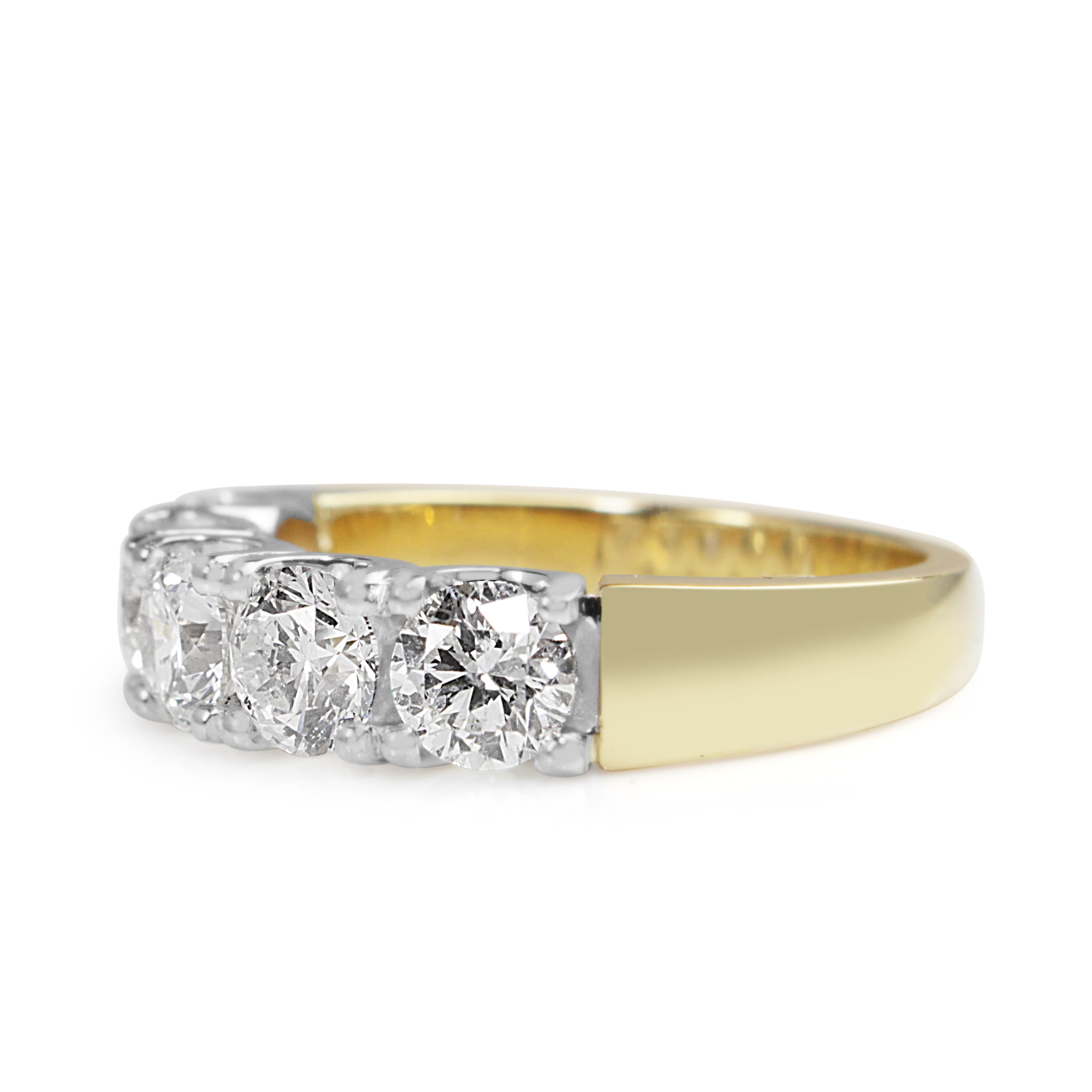 Side view of 18ct gold five stone diamond ring