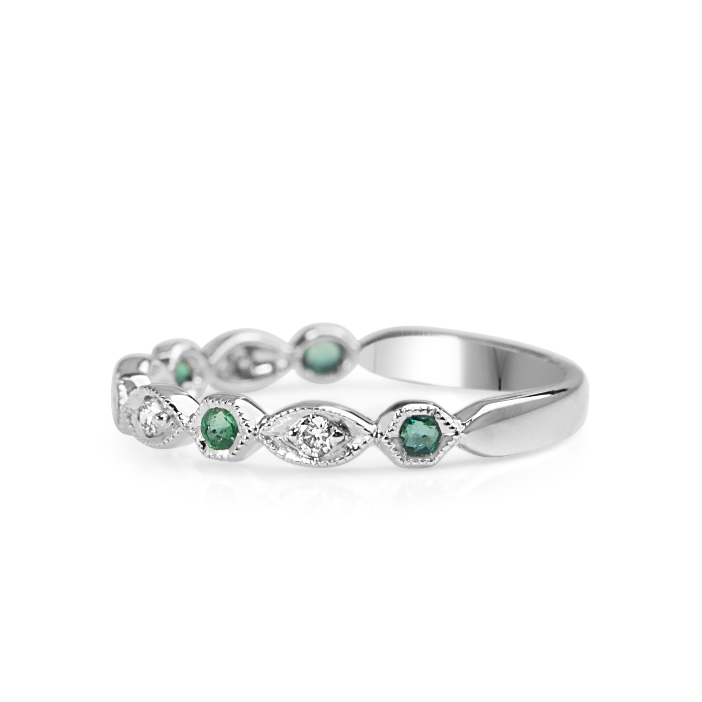 Side view of 9ct white gold emerald and diamond ring