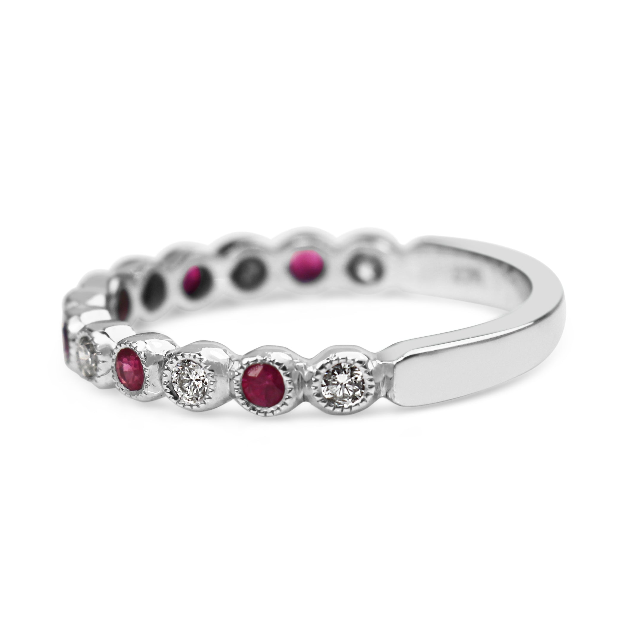 Side view of the 9ct white gold ruby and diamond band