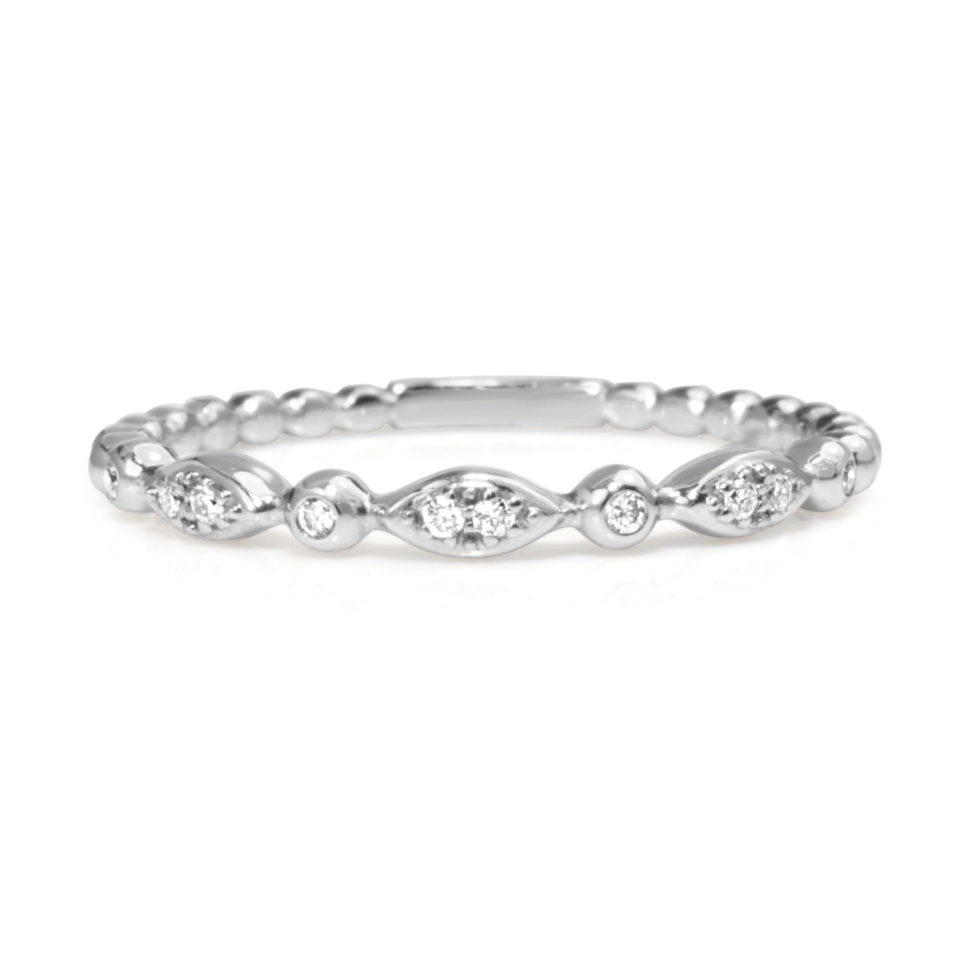 9ct white gold vintage style diamond band shown from the front with alternating diamond-set details