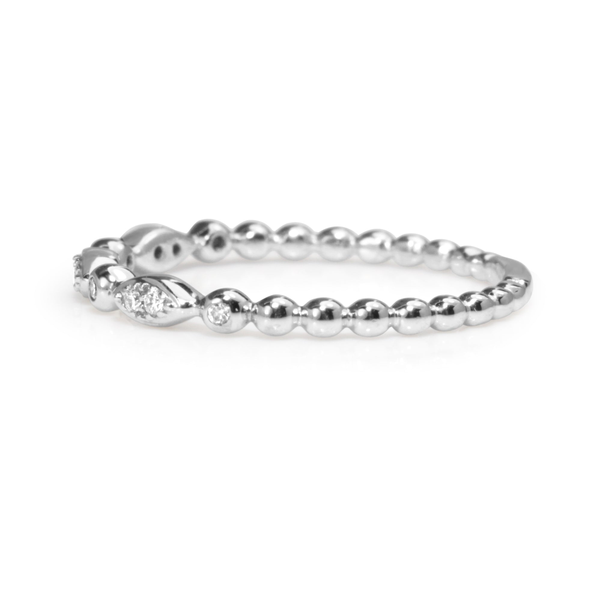 Side view of 9ct white gold vintage style diamond band showing the fine 2mm profile