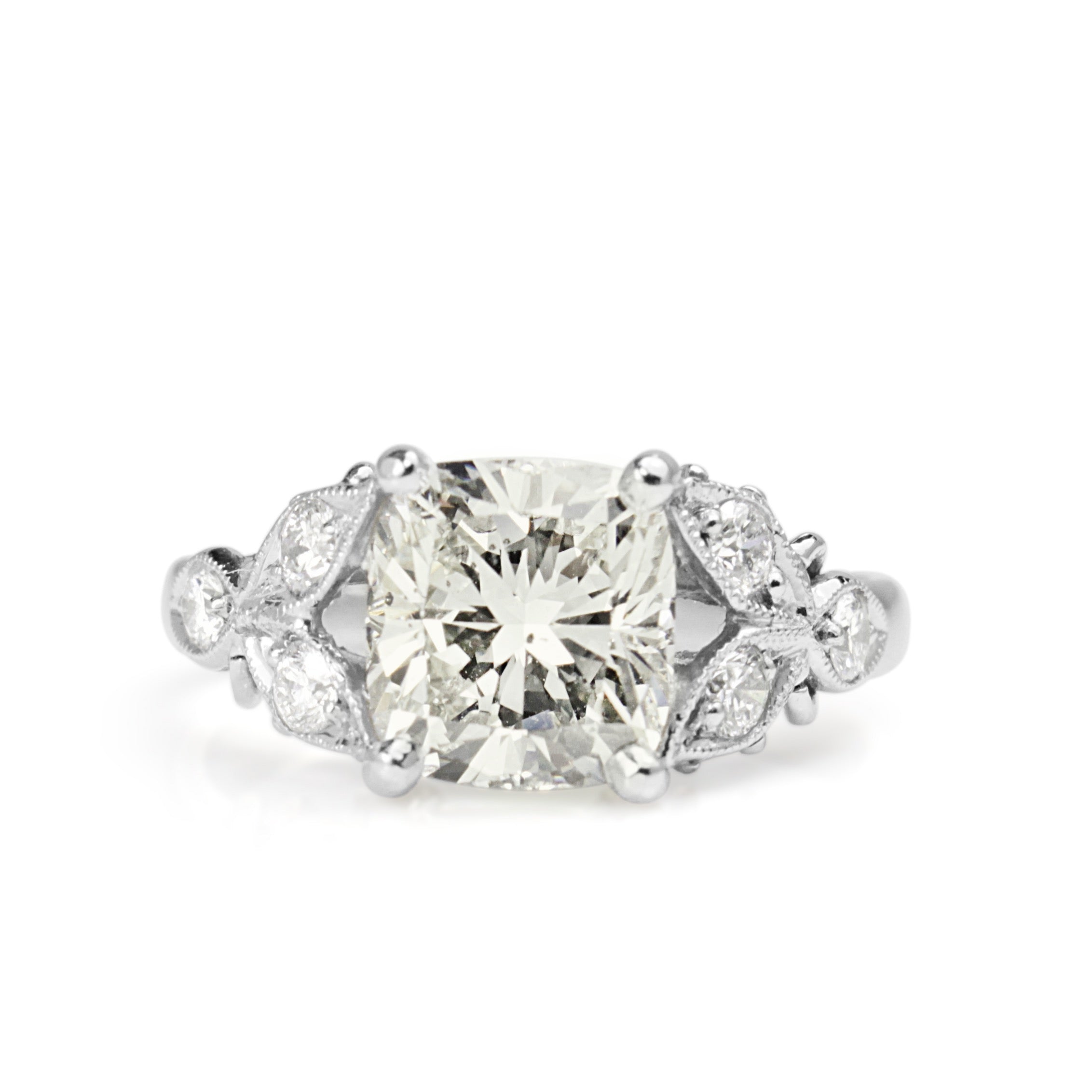 Vintage diamond engagement ring close up platinum cushion cut