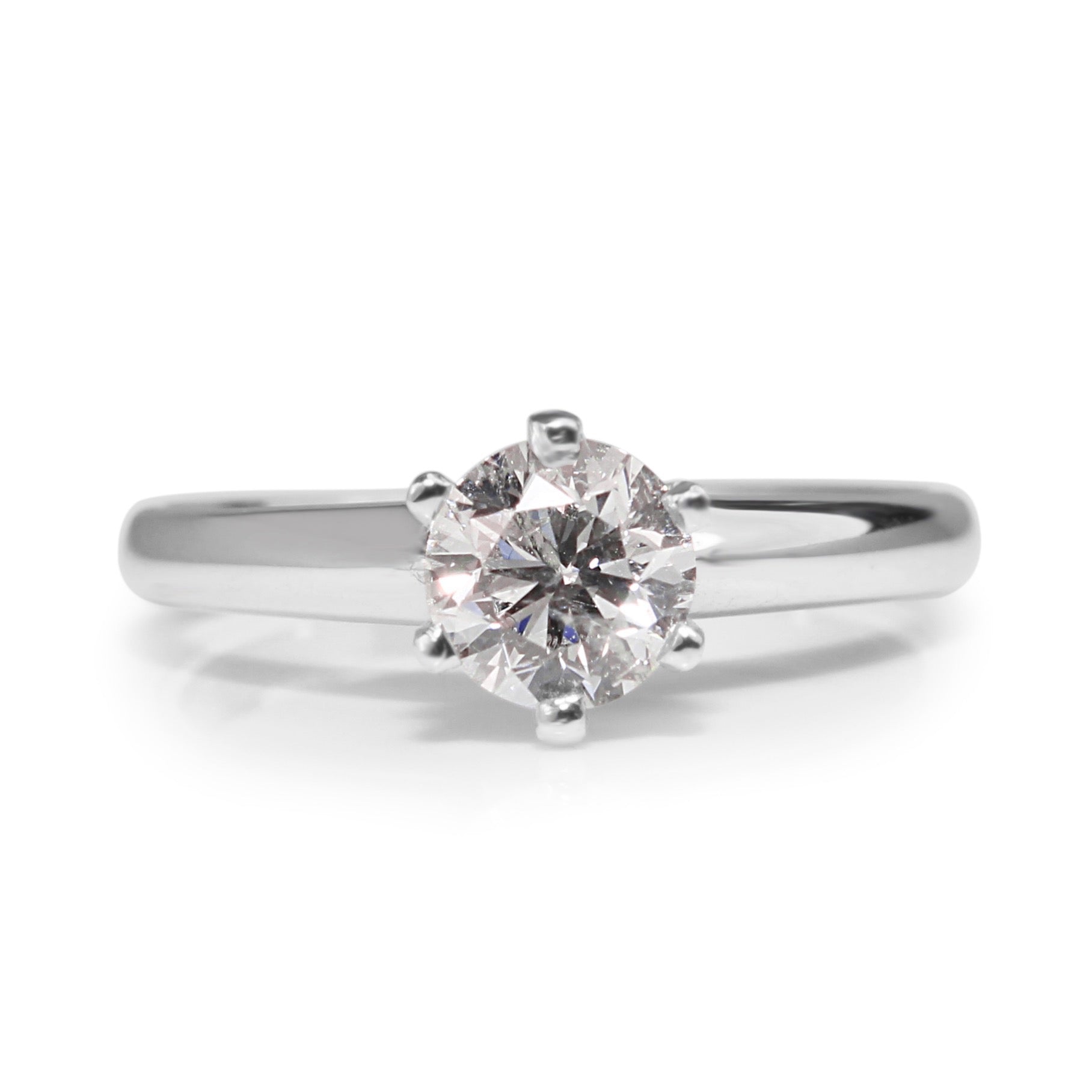 18ct white gold diamond 6 claw solitaire engagement ring on hand