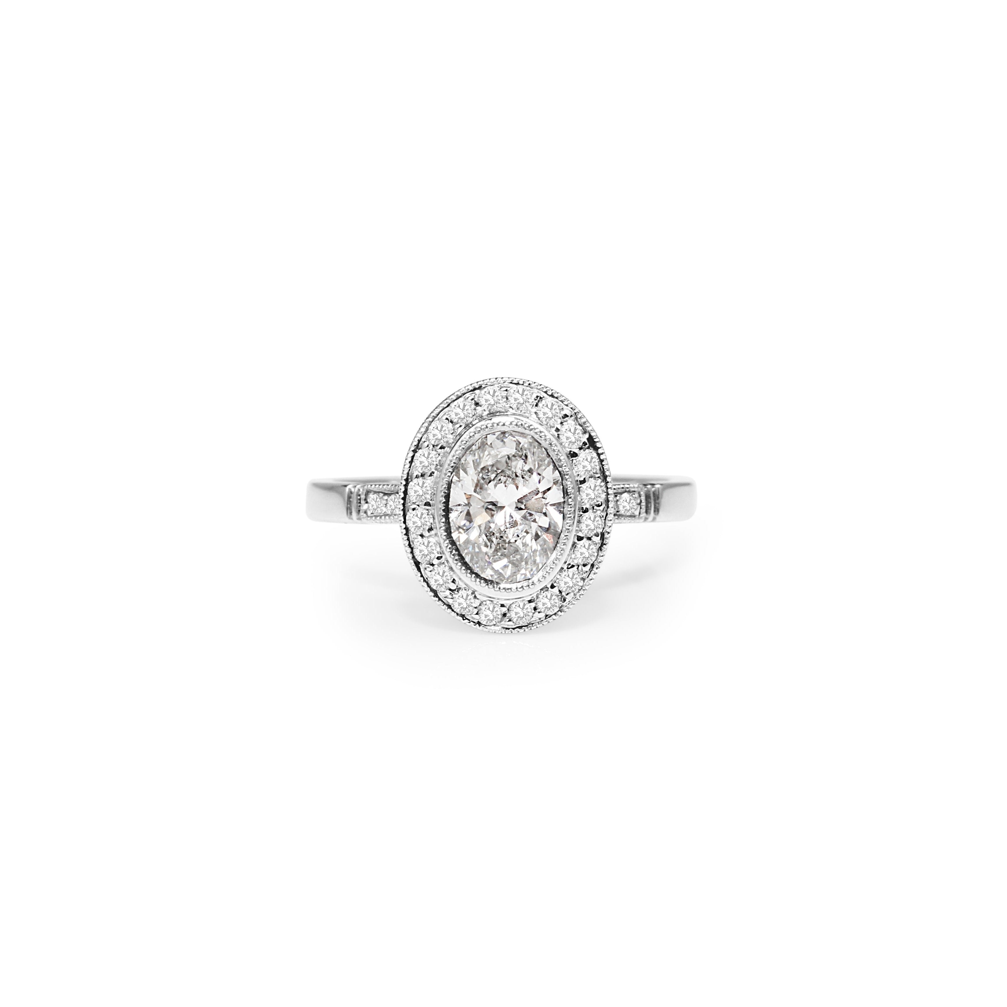 Oval Bezel Halo Diamond Ring