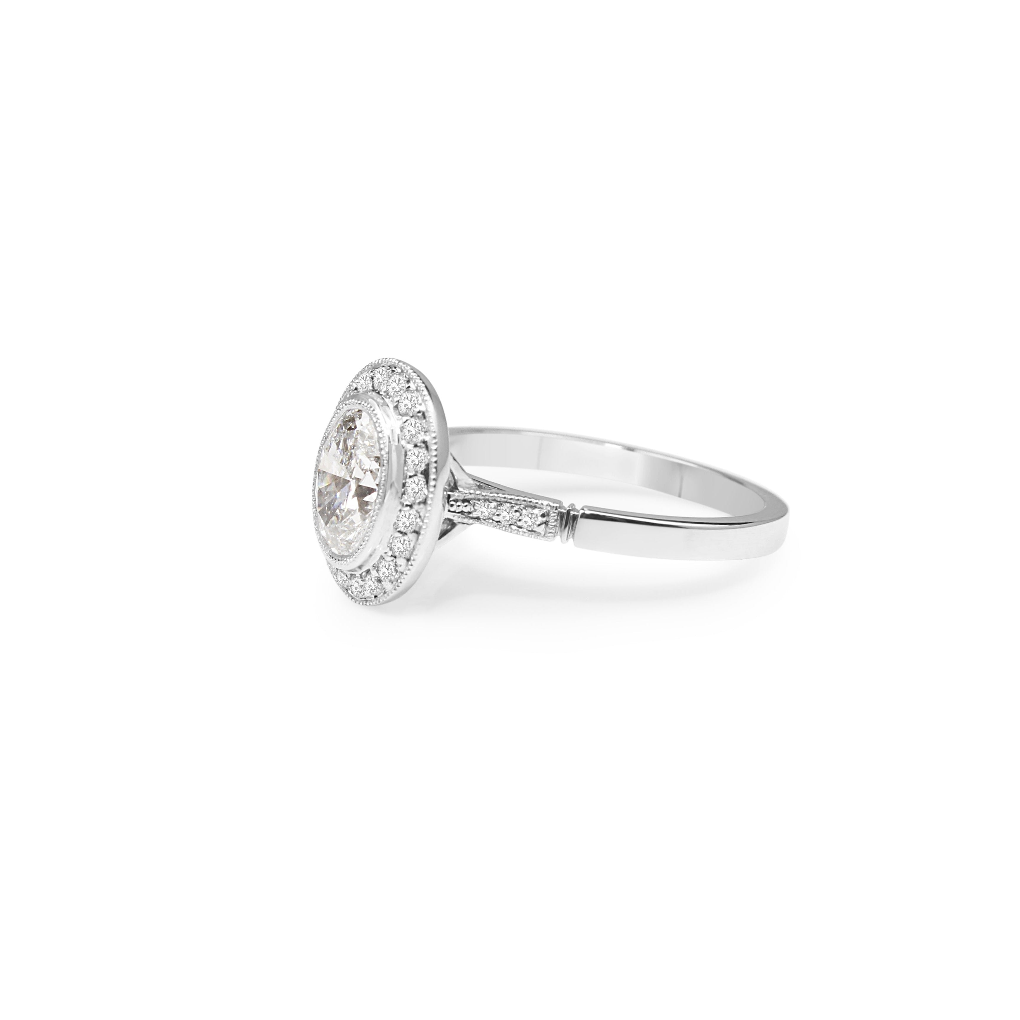 Oval Bezel Halo Diamond Ring