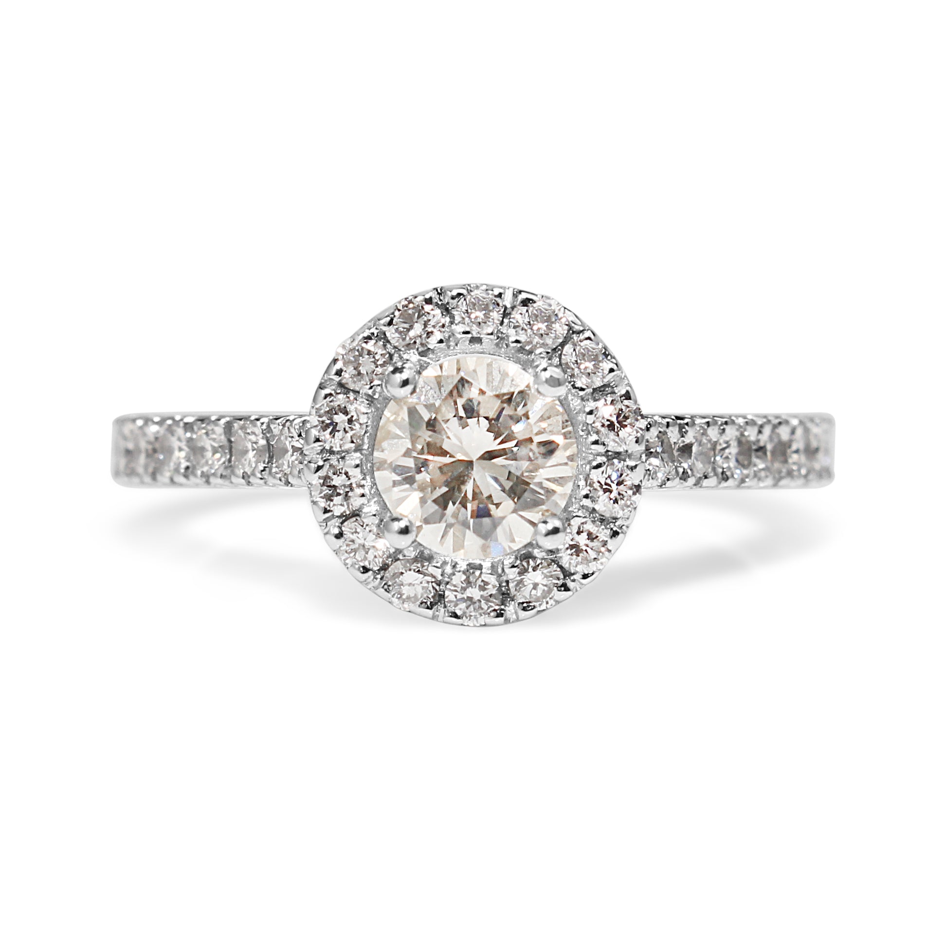 18ct white gold diamond halo engagement ring close up diamond jewellery