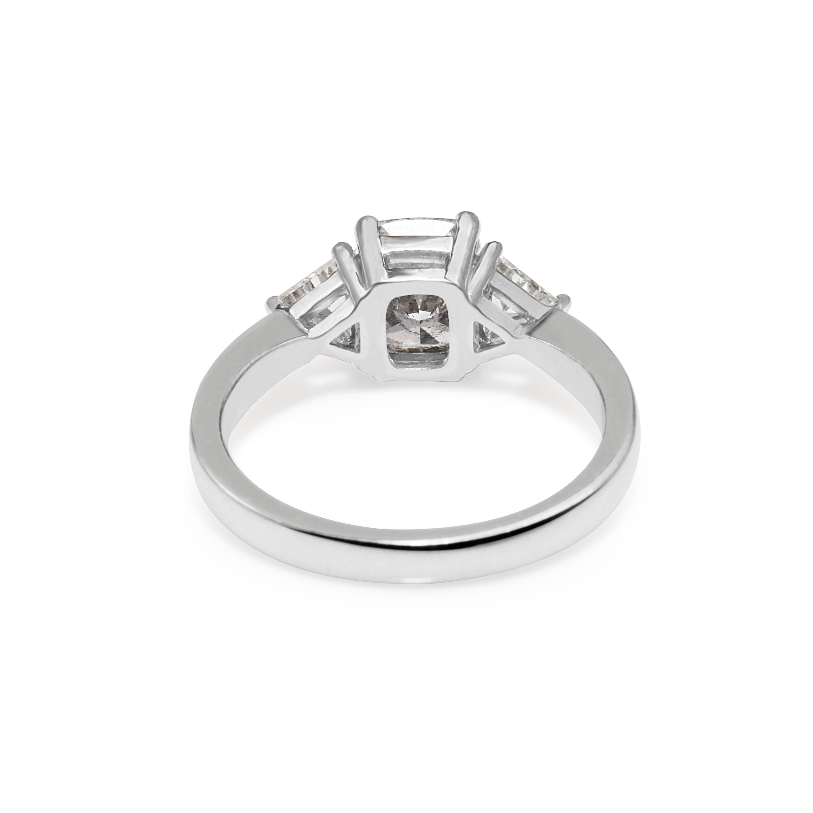 luxury engagement ring with cushion cut centre diamond