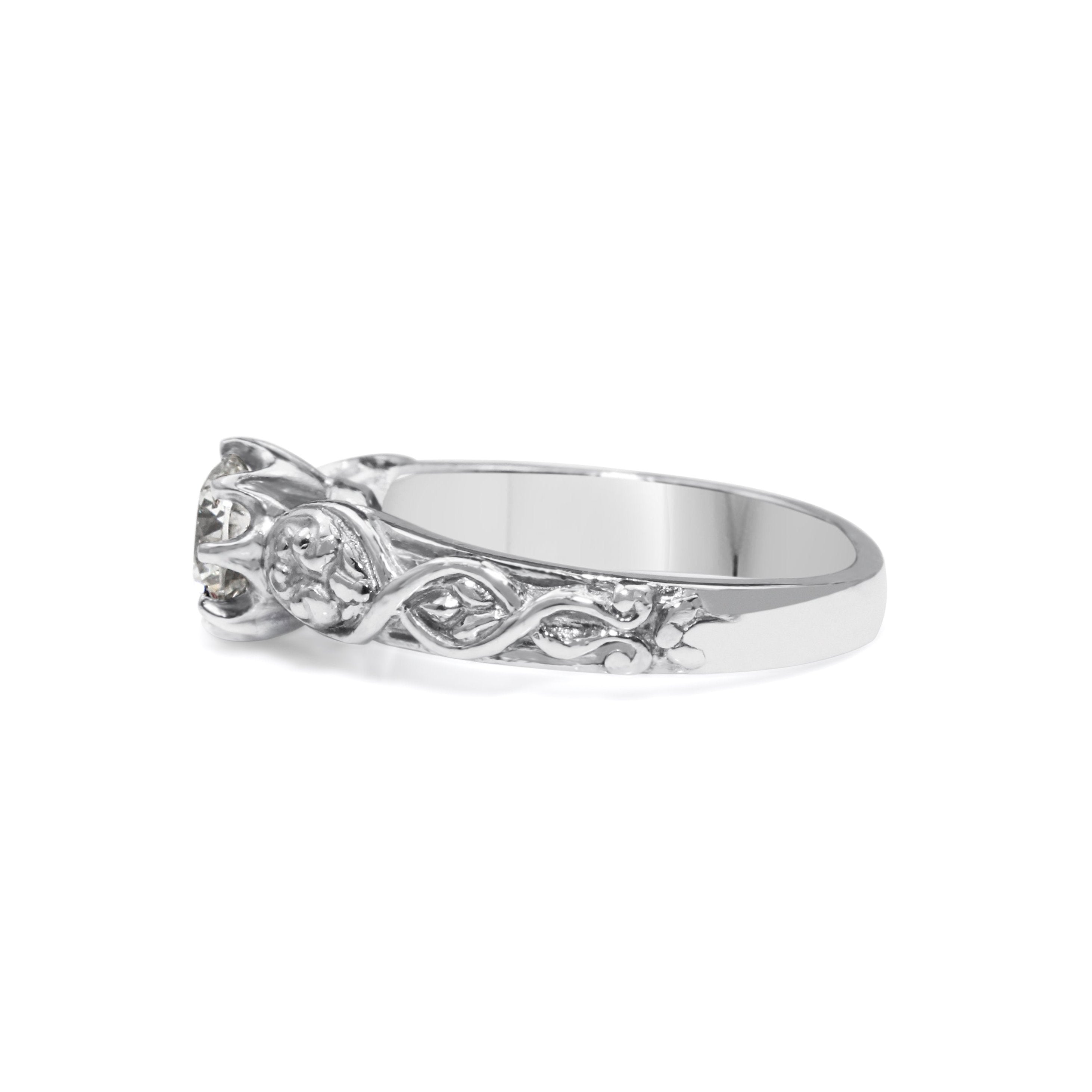 Luxury engagement ring with diamond and hand engraving