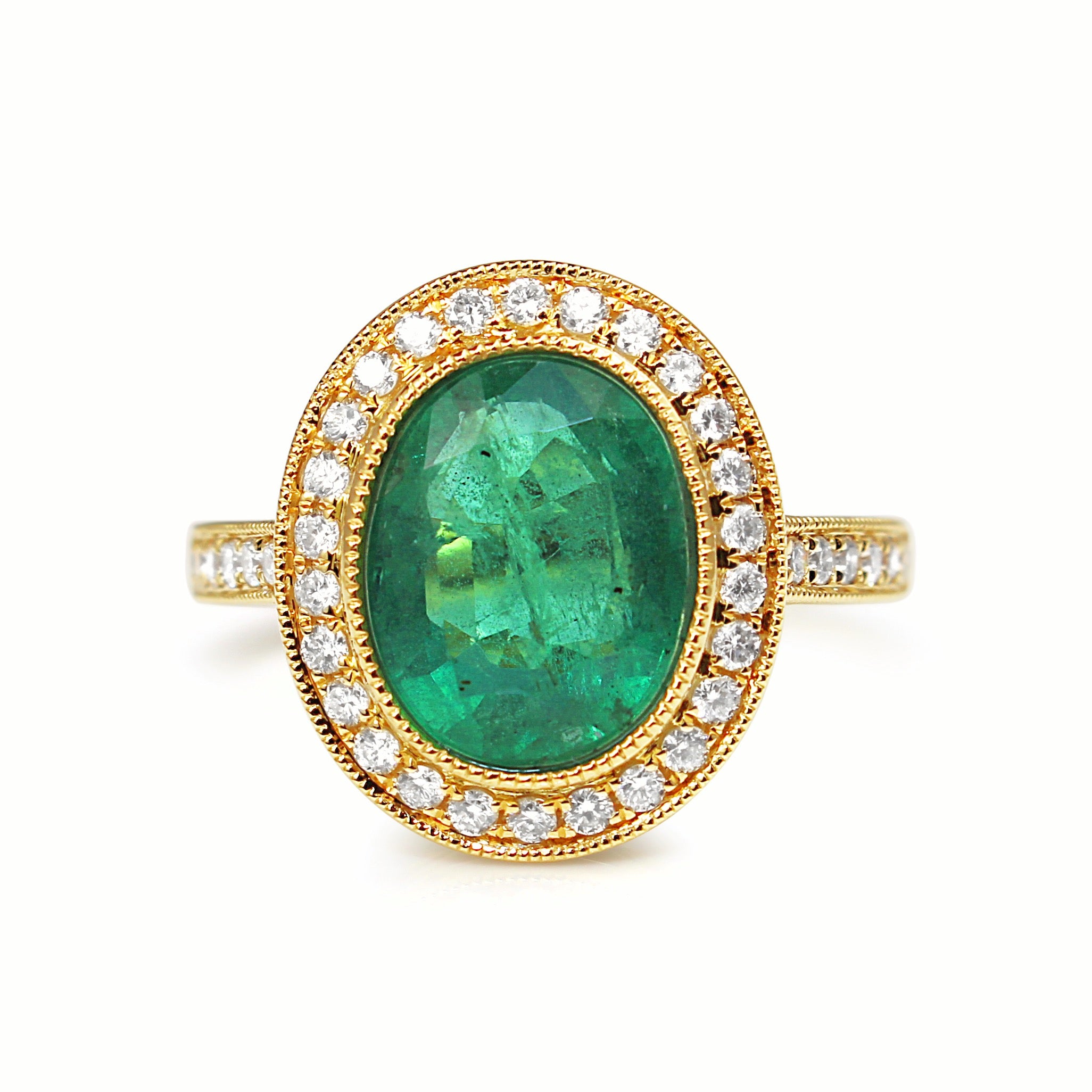 18ct Yellow Gold Emerald and Diamond Halo Ring