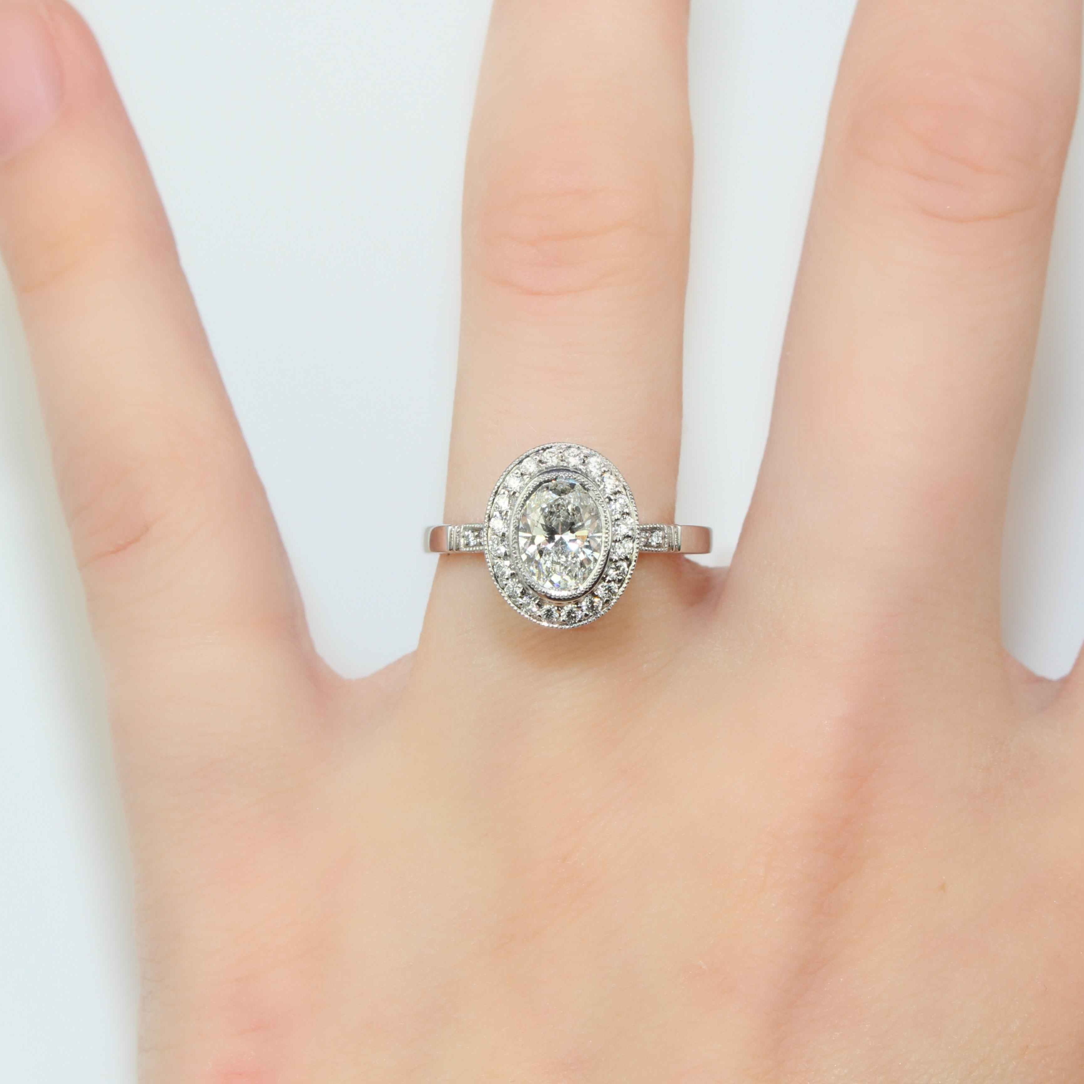 Oval Bezel Halo Diamond Ring